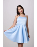 tween girl  wearing a light blue satin spaghetti strap fit and flare party dress 