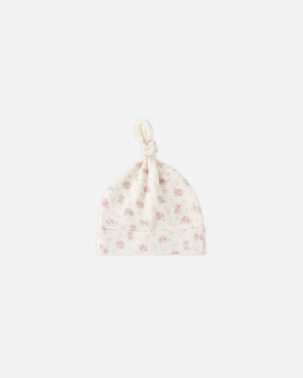 Floral patterned baby hat on a white background